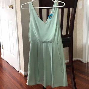 Never worn light green dress. Pretty back detail